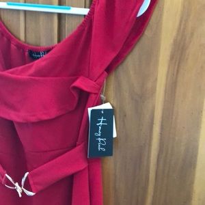 Red jumpsuit brand new with tags. Size L